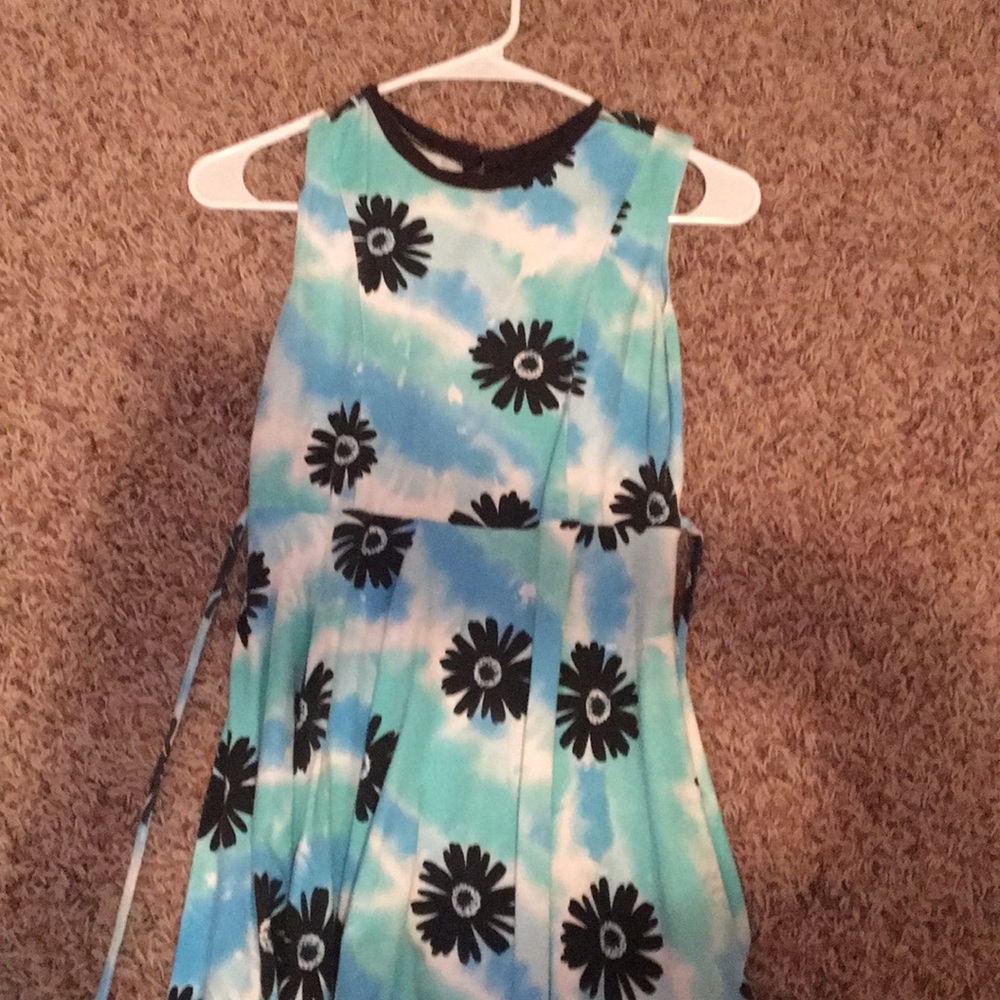 Blue dress with black flowers with button in back